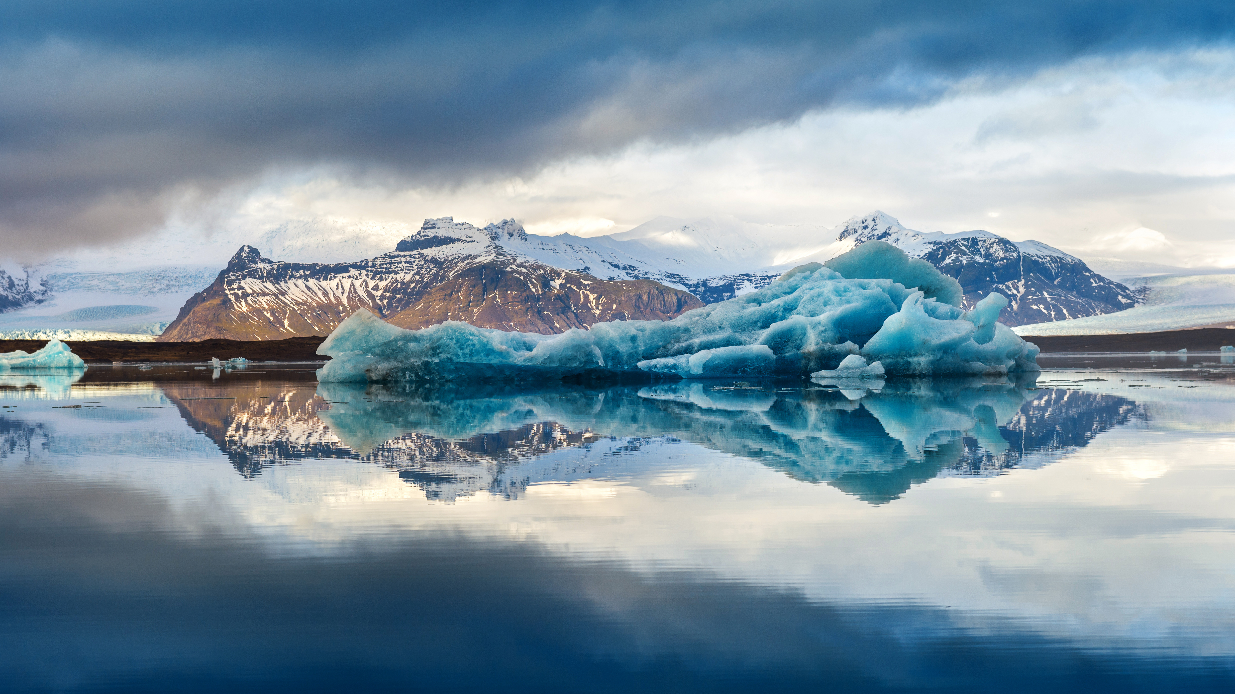Glacial icebergs reflecting in Alaskan waters